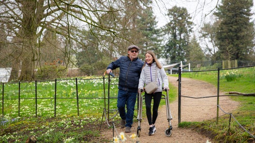 Visitors enjoying an accessible visit to the gardens